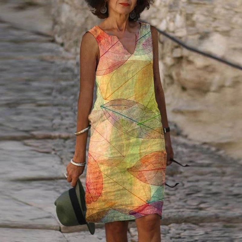 Nele – Stilvolles ärmelloses Kleid mit Blumenmuster und V Ausschnitt