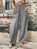 Hannah – Locker geschnittene lange Hose mit elastischem Bund und Taschen