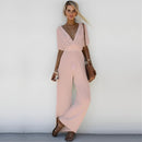 Zinka - Stylischer Jumpsuit mit tiefem V Ausschnitt und weiten Hosenbeinen
