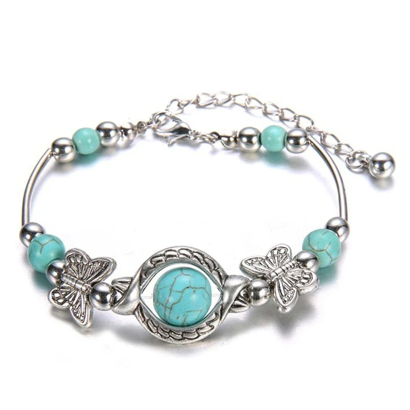 Milla – Verstellbares Schmetterlings Charm Armband mit einzigartigen Perlen