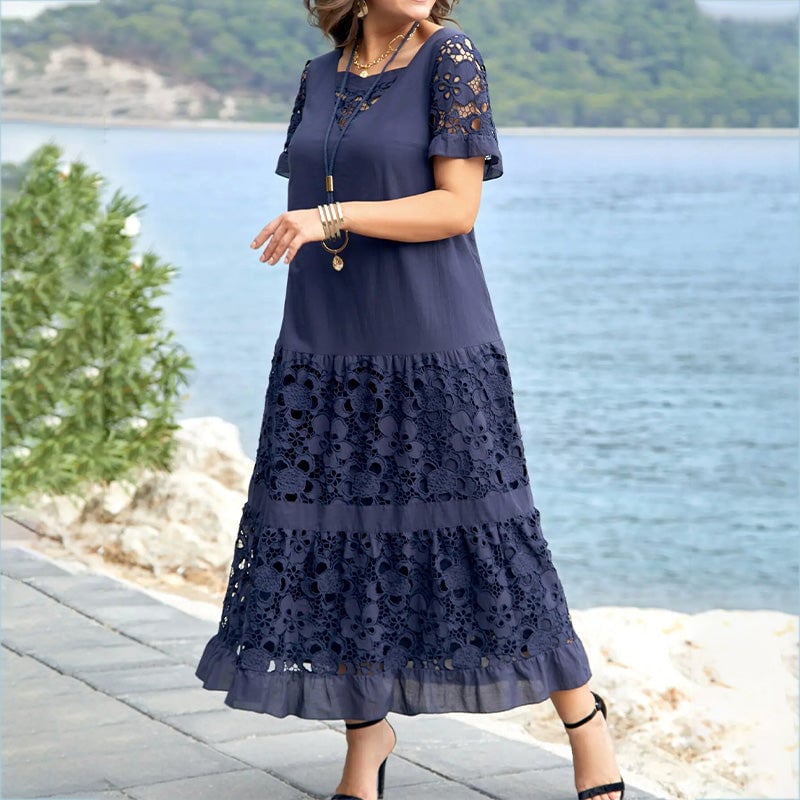 Emma – Elegantes Blumenkleid mit kurzen Ärmeln und Rüschenakzenten