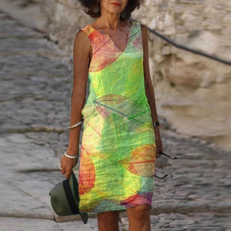 Nele – Stilvolles ärmelloses Kleid mit Blumenmuster und V Ausschnitt