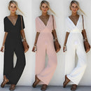 Zinka - Stylischer Jumpsuit mit tiefem V Ausschnitt und weiten Hosenbeinen