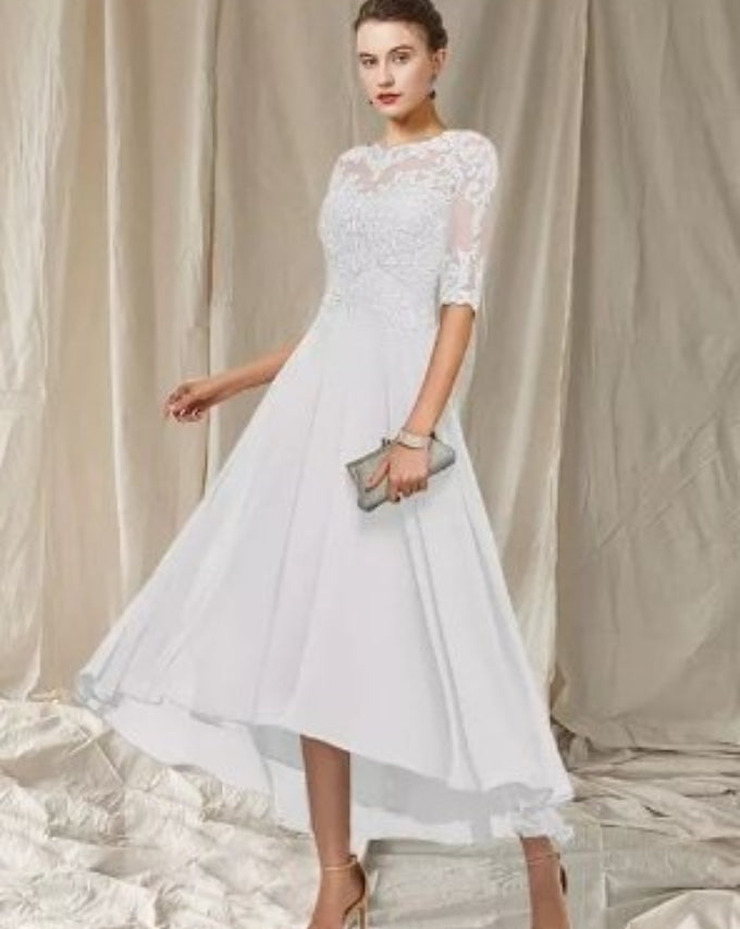 Paula – Elegantes Rundhalskleid mit kurzen Ärmeln für einen luxuriösen Look