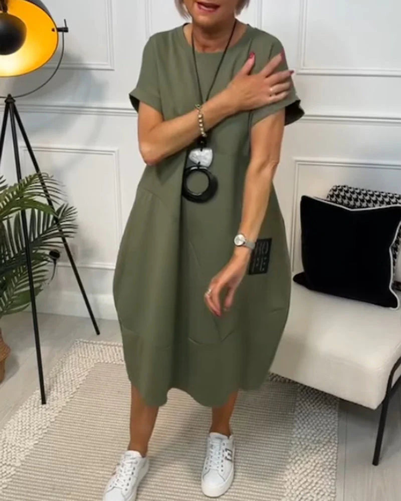 Sunniva – Stylisches Kurzarmkleid mit Rundhalsausschnitt und Taschen