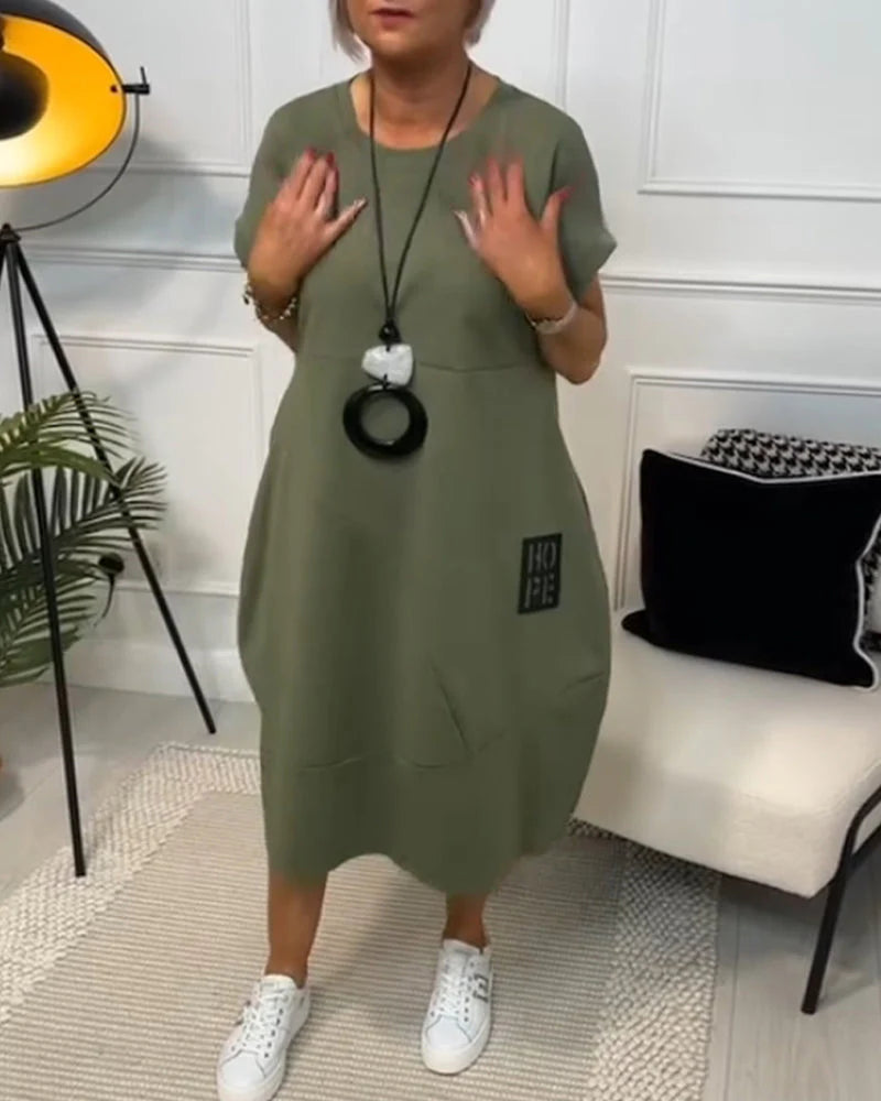 Sunniva – Stylisches Kurzarmkleid mit Rundhalsausschnitt und Taschen