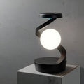 GlobeBeam – Moderne wiederaufladbare Schreibtischlampe mit rotierender Kugel