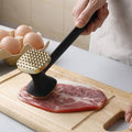 MeatMaster - Präzisionshammer für die perfekte Fleischbeschmierung