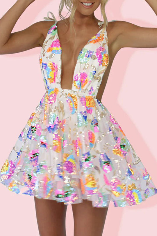 Elke – Stilvolles rückenfreies Minikleid mit tiefem V-Ausschnitt und Blumendruck