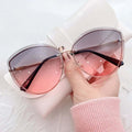 Eliana – Modische Cat-Eye-Sonnenbrille mit dunklen Gläsern und UV-Schutz