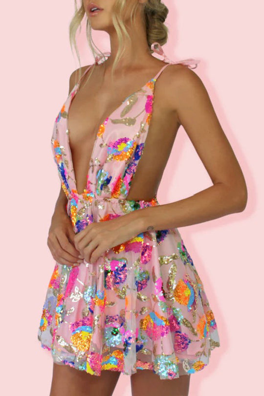 Elke – Stilvolles rückenfreies Minikleid mit tiefem V-Ausschnitt und Blumendruck