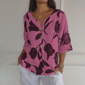 Hedda – Bluse mit V Ausschnitt und kurzen Ärmeln und Blumenmuster