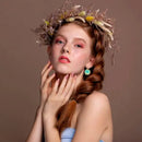 Ziska – Runde Ohrstecker in strukturierter Türkis-Optik