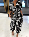 Nora – Bedruckter Jumpsuit mit Knopfleiste und kurzen Ärmeln
