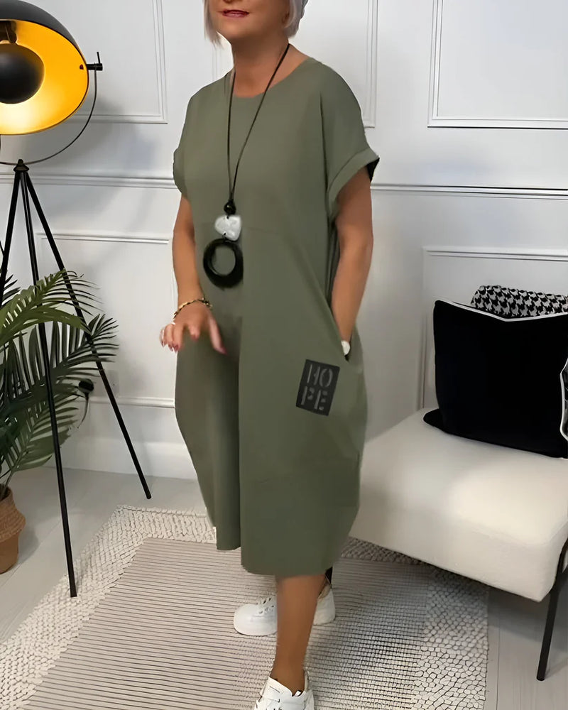 Sunniva – Stylisches Kurzarmkleid mit Rundhalsausschnitt und Taschen