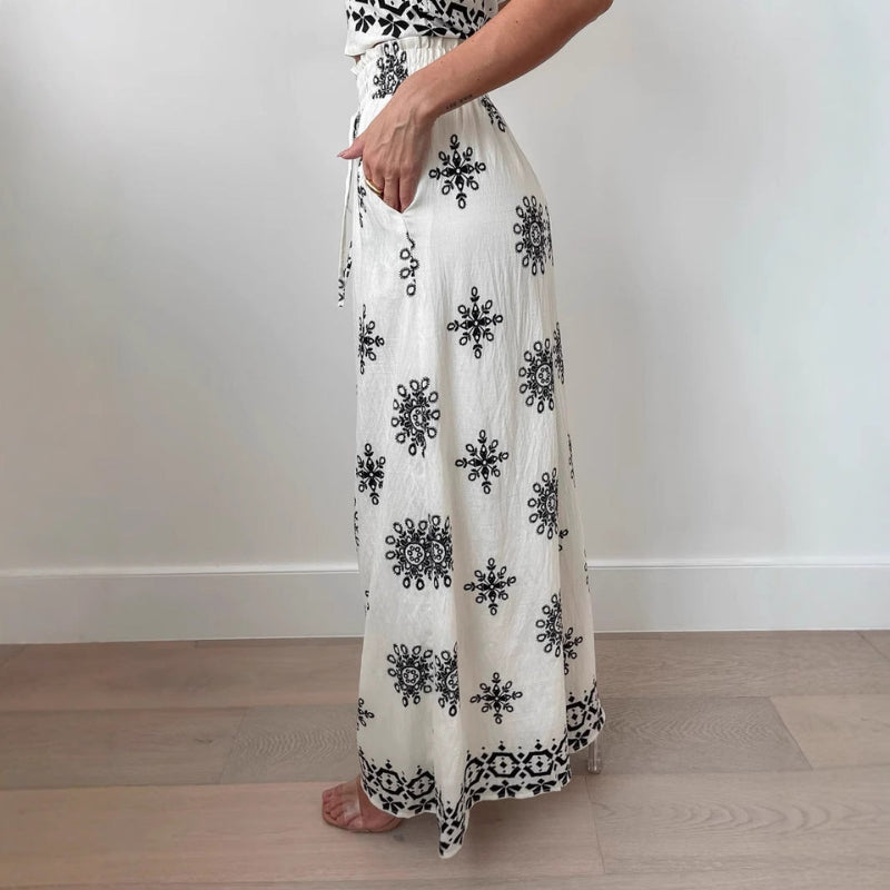 Melina – Zweiteiliges Set mit ärmellosem Oberteil und hoch taillierter Hose mit weitem Bein