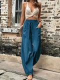 Hannah – Locker geschnittene lange Hose mit elastischem Bund und Taschen