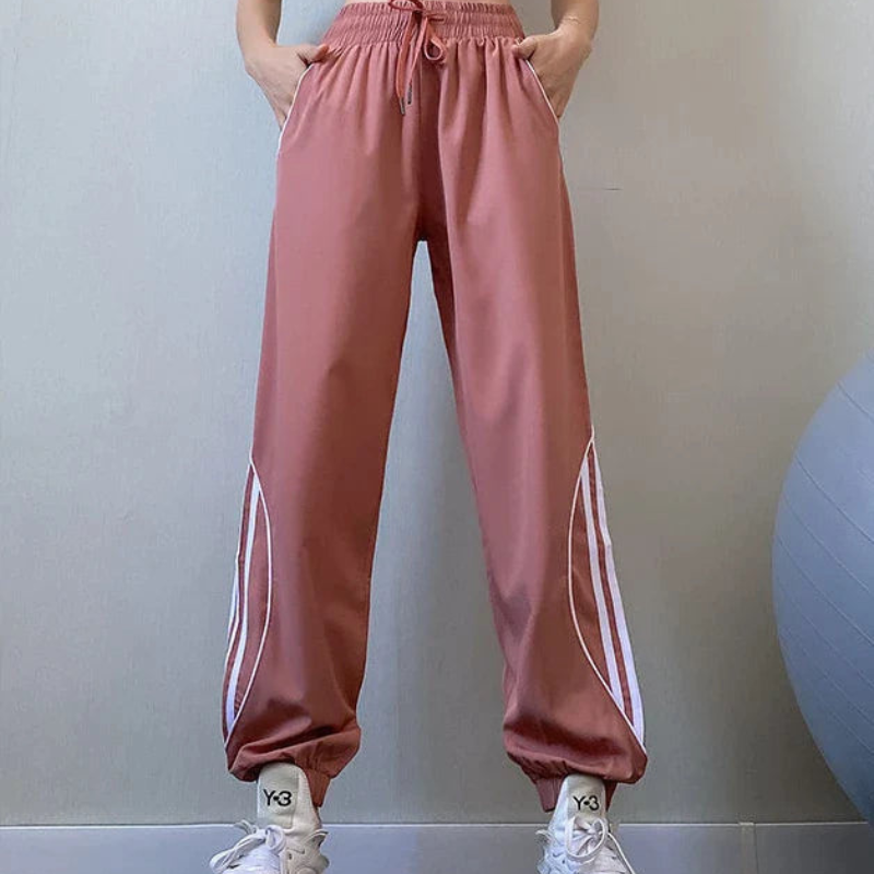 Emma – Lässige Hohe Taille Jogginghose mit Seitenstreifen und Taschen