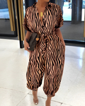 Nora – Bedruckter Jumpsuit mit Knopfleiste und kurzen Ärmeln