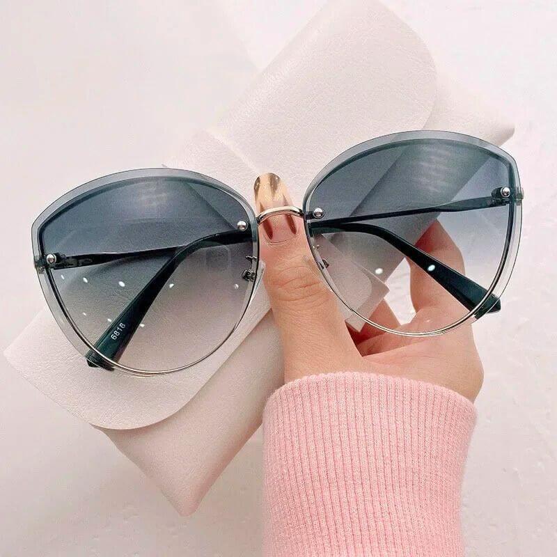 Eliana – Modische Cat-Eye-Sonnenbrille mit dunklen Gläsern und UV-Schutz