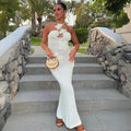 Miriam – Stilvolles rückenfreies langes Blumenkleid mit Neckholder und schmaler Passform