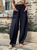 Hannah – Locker geschnittene lange Hose mit elastischem Bund und Taschen