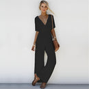 Zinka - Stylischer Jumpsuit mit tiefem V Ausschnitt und weiten Hosenbeinen