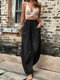 Hannah – Locker geschnittene lange Hose mit elastischem Bund und Taschen