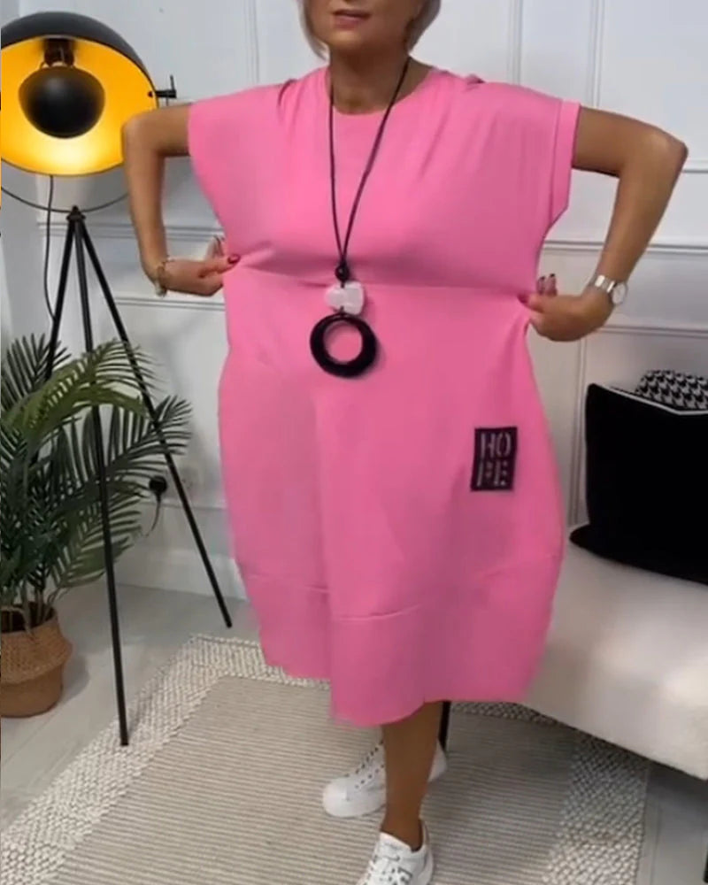Sunniva – Stylisches Kurzarmkleid mit Rundhalsausschnitt und Taschen
