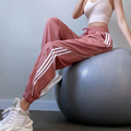 Emma – Lässige Hohe Taille Jogginghose mit Seitenstreifen und Taschen