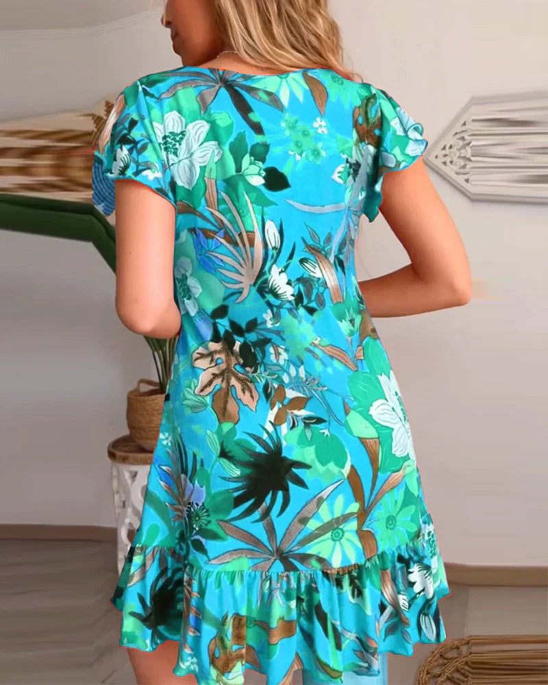 Aria – Entspanntes Blumenkleid mit Rüschensaum und V-Ausschnitt