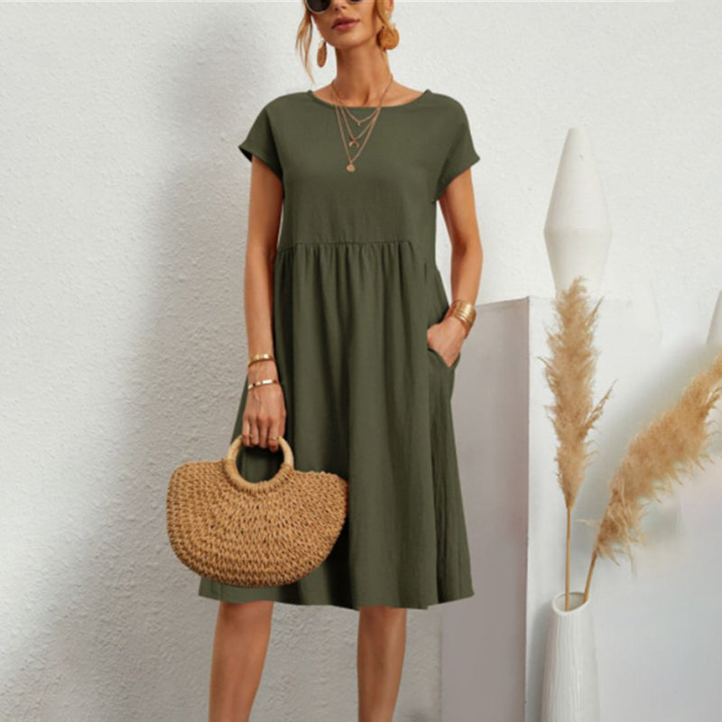 Gudrun – Leichtes knielanges Kleid mit Rundhalsausschnitt kurzen Ärmeln und Taschen