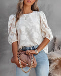 Rhea – Elegante Blumenbluse mit V-Ausschnitt und Puffärmeln