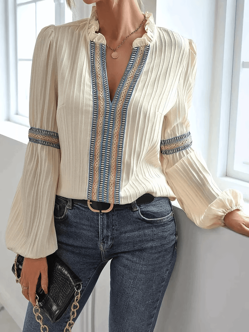 Mira – Lässige Bluse mit tiefem V-Ausschnitt und Puffärmeln