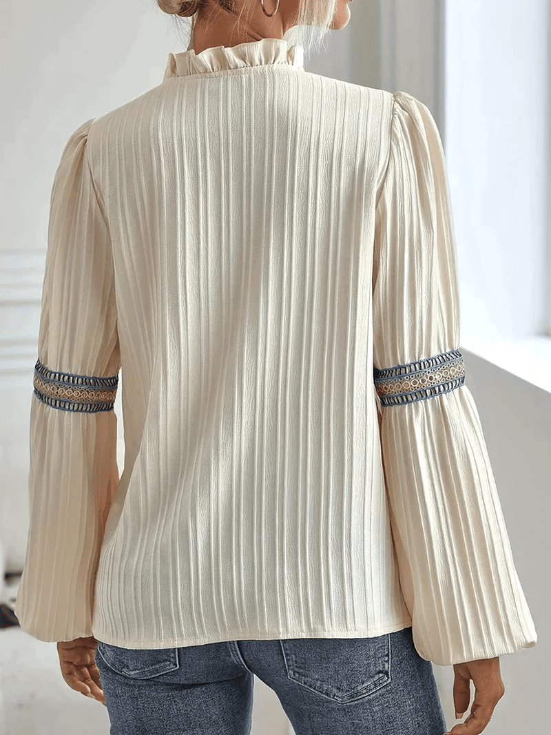 Mira – Lässige Bluse mit tiefem V-Ausschnitt und Puffärmeln