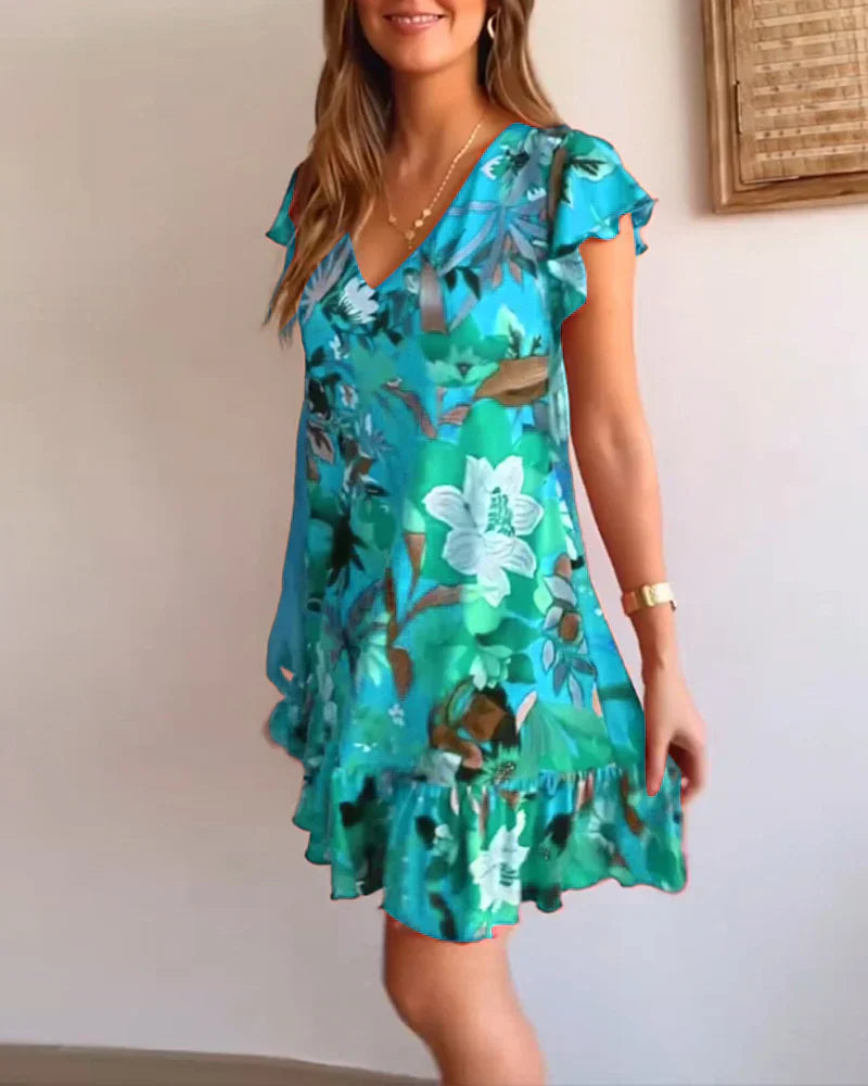 Aria – Entspanntes Blumenkleid mit Rüschensaum und V-Ausschnitt