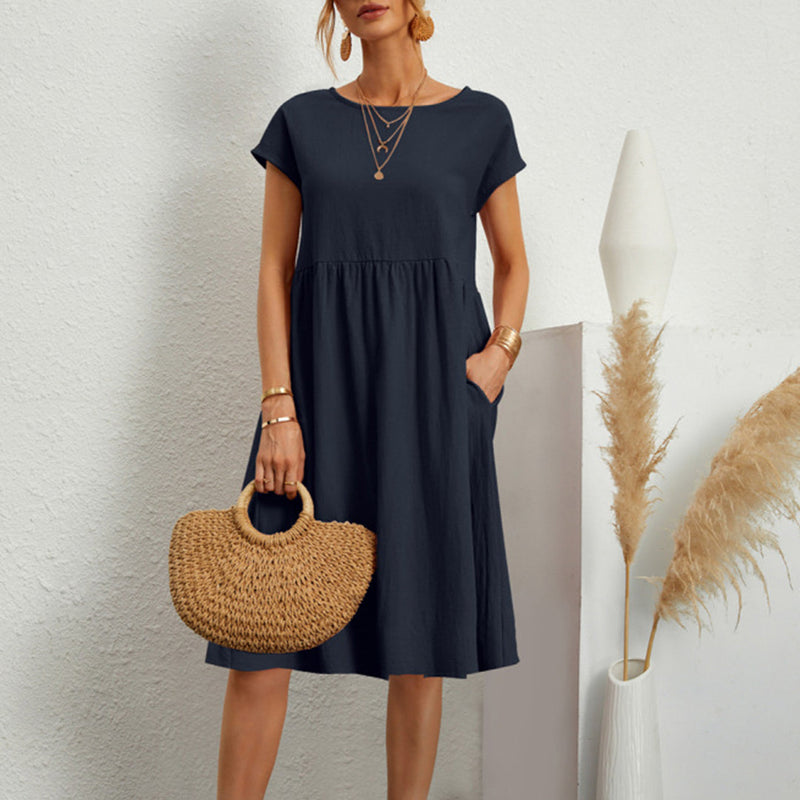 Gudrun – Leichtes knielanges Kleid mit Rundhalsausschnitt kurzen Ärmeln und Taschen
