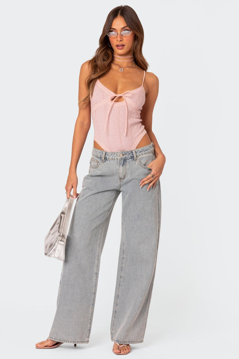 Elina – Lässige Hohe Taille weites Bein Hose mit Schleifenprint und Tasche