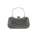 Sorina – Kleine Clutch Tasche mit geometrischem Muster