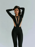 Andrea – Stylischer Figurbetonter Jumpsuit mit Rundhalsausschnitt und langen Ärmeln