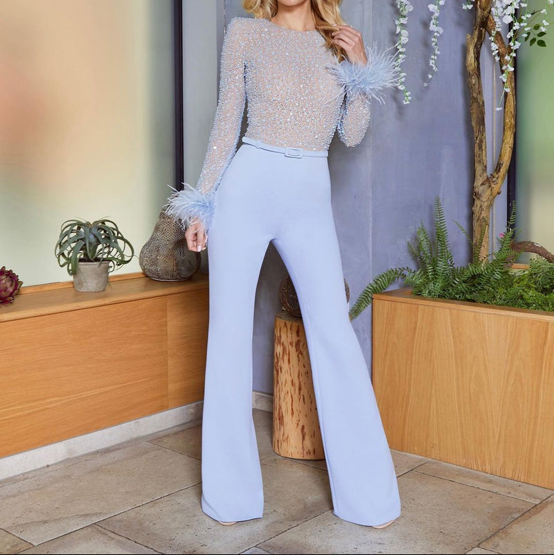 Mila – Lässiger Jumpsuit mit ausgestelltem Bein und langen Ärmeln