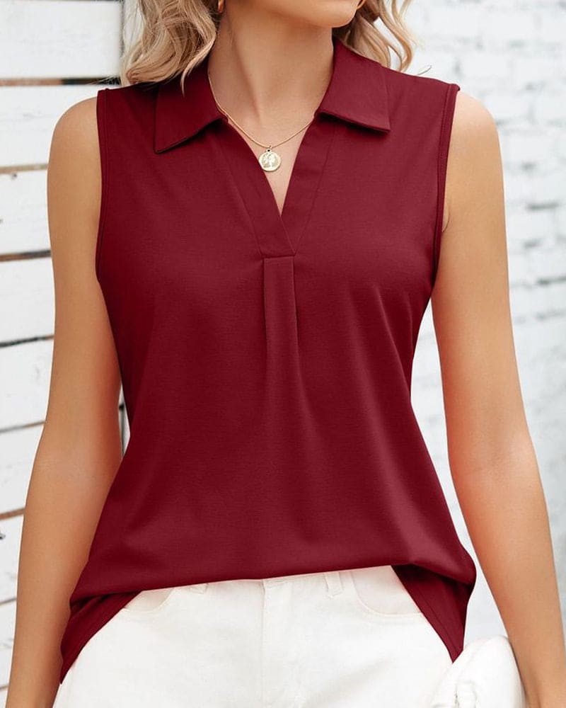 Zara – Ärmellose Bluse mit klassischem Kragen und Falte vorne