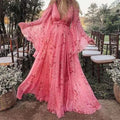 Clara – Elegantes Kleid mit Blumenmuster tiefem V Ausschnitt und Glockenärmeln