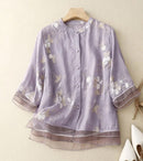 Amelie – Lässige Langarmbluse mit Rundhalsausschnitt und Knopfdetails