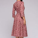 Tania - Lässiges mittellanges Kleid mit Rundhalsausschnitt Blumendruck und Taschen