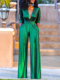 Anna - Eleganter tiefem V-Ausschnitt Jumpsuit mit langen Ärmeln und weitem Bein