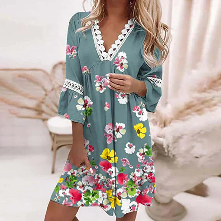 Elinora – Stilvolles Minikleid mit Blumenmuster und V Ausschnitt und langen Ärmeln