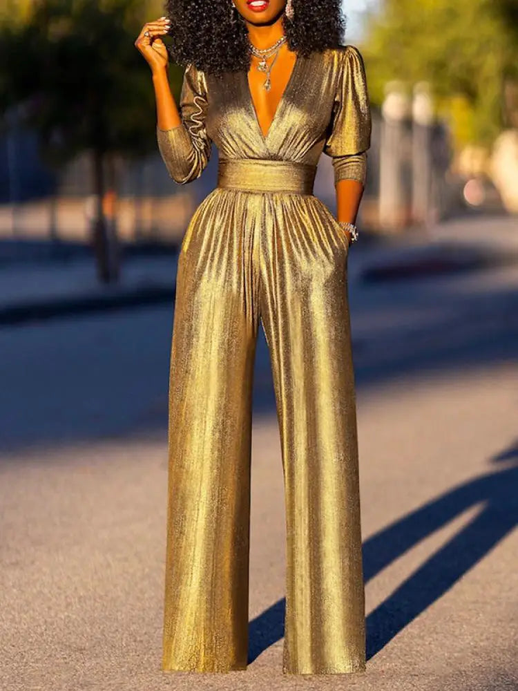 Anna - Eleganter tiefem V-Ausschnitt Jumpsuit mit langen Ärmeln und weitem Bein