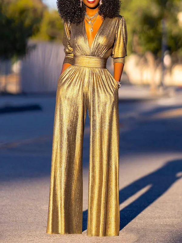Anna - Eleganter tiefem V-Ausschnitt Jumpsuit mit langen Ärmeln und weitem Bein