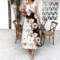 Maya – Ärmelloses Maxikleid mit Blumenmuster und lockerer Passform